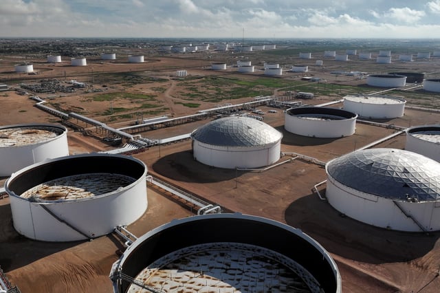A drone view shows a portion of the crude oil tank farm in Midland, Texas, U.S. June 11, 2025. REUTERS/Eli Hartman/File Photo