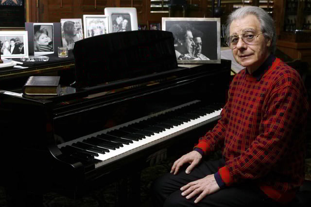 Grammy Award-winning composer Lalo Schifrin appears at his studio in Beverly Hills on May 10, 2006. Schifrin, the composer behind the scores for “Bullitt,” “Dirty Harry” and “Mission: Impossible,” has died at 93. 