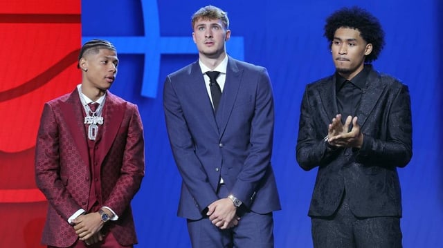 Jun 25, 2025; Brooklyn, NY, USA; Jeremiah Fears, Cooper Flagg, and Dylan Harper stand on stage before the 2025 NBA Draft at Barclays Center. Mandatory Credit: Brad Penner-Imagn Images