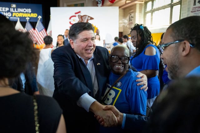 Gov. JB Pritzker greets supporters after announcing his bid for a third term on June 26, 2025, at the Grand Crossing Park Field House in Chicago. (Brian Cassella/Chicago Tribune)