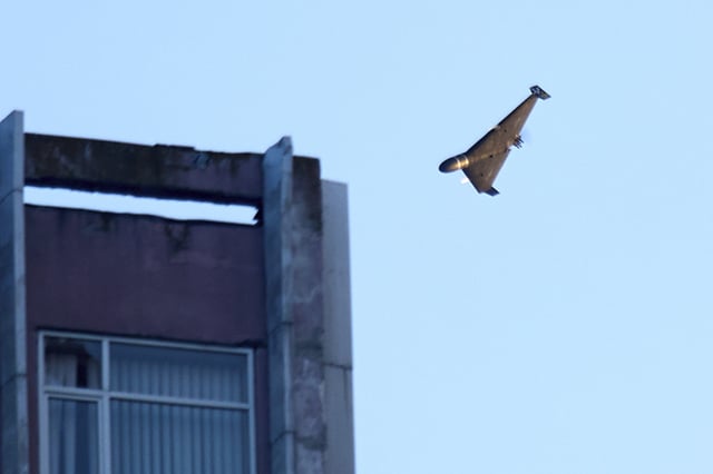 A Russian drone attacks a building during Russia's massive missile and drone air attack in Kyiv, Ukraine, Tuesday, June 17, 2025. (AP Photo/Efrem Lukatsky)