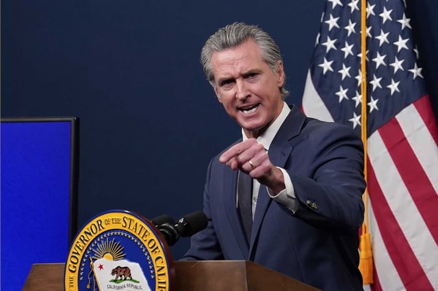 California Gov. Gavin Newsom presents his revised state budget during a news conference in Sacramento on May 14, 2025. 