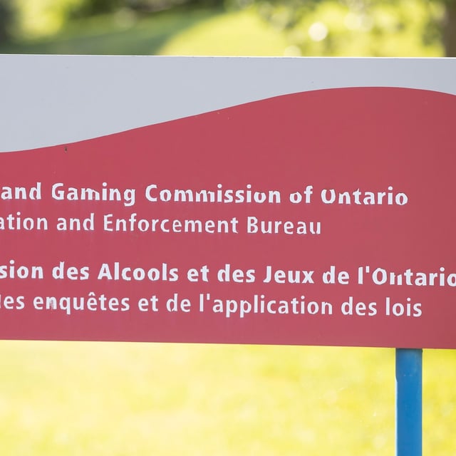 An Alcohol and Gaming Commission of Ontario Investigation and Enforcement Bureau sign is shown in Gananoque, Ont., Friday, July 30, 2021. THE CANADIAN PRESS/Lars Hagberg