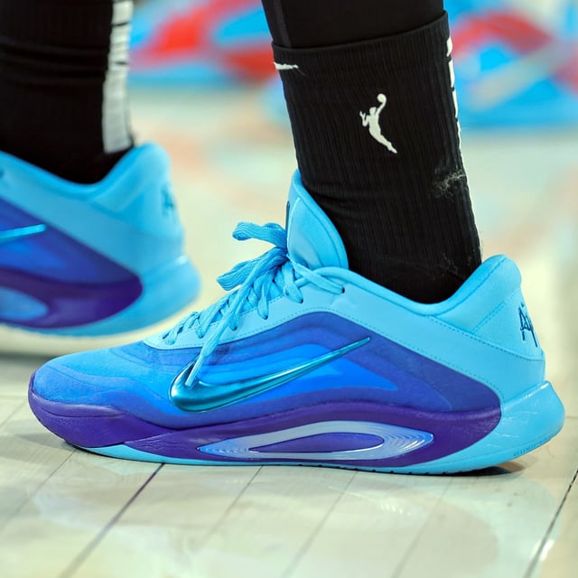 A'ja Wilson of the Las Vegas Aces wears a pair of her Nike A'One Everlasting player exclusive signature shoes in the fourth quarter of a game against the Washington Mystics at Michelob ULTRA Arena on June 26, 2025 in Las Vegas, Nevada.