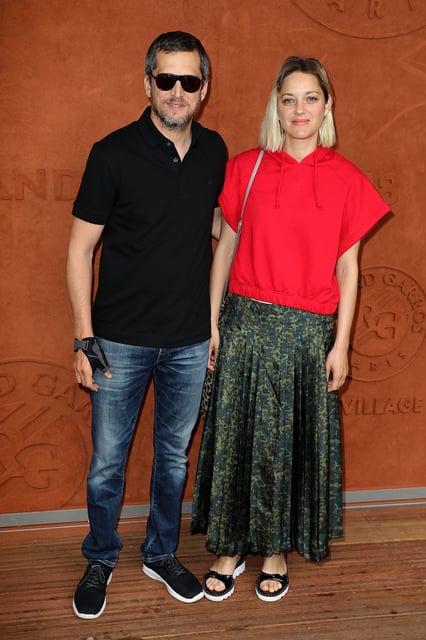 Guillaume Canet et Marion Cotillard à Roland-Garros. (Paris, le 10 juin 2018.)
