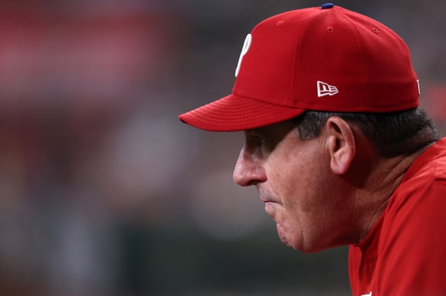 PHOENIX, ARIZONA - AUGUST 11: Manager Rob Thomson #59 of the Philadelphia Phillies watches the action during the ninth inning against the Arizona Diamondbacks at Chase Field on August 11, 2024 in Phoenix, Arizona. (Photo by Chris Coduto/Getty Images)