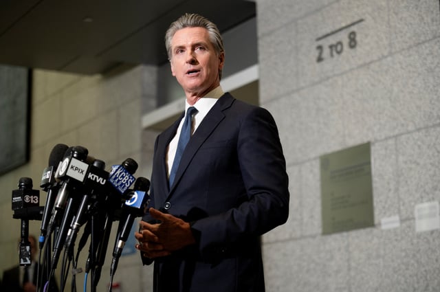 California Governor Gavin Newsom speaks to the press after a hearing on the use of National Guard troops amid federal immigration sweeps, at the California State Supreme Court in San Francisco, California, U.S., June 12, 2025. REUTERS/Yuri Avila/File photo