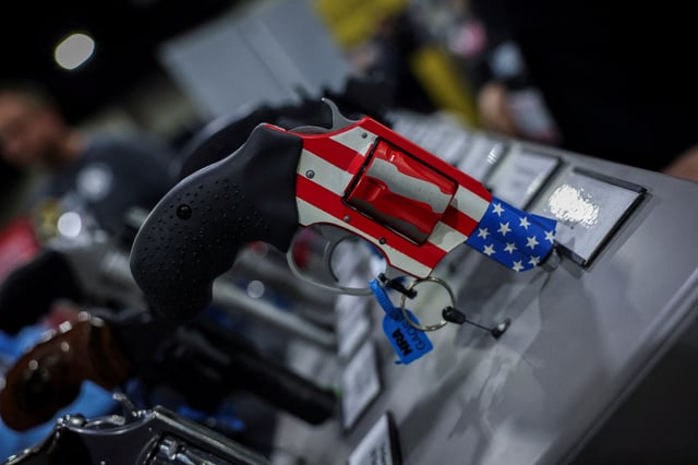 An American theme of a gun displays during the National Rifle Association annual meeting in Atlanta, Georgia, U.S. April 25, 2025. REUTERS/Jeenah Moon/File photo
