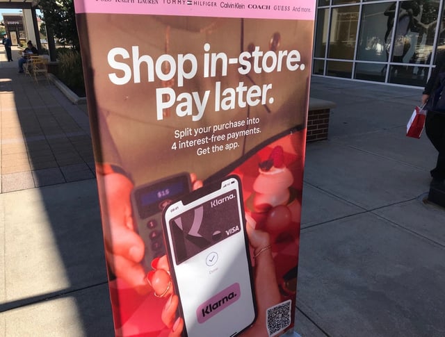 A sign advertising buy now, pay later firm Klarna.