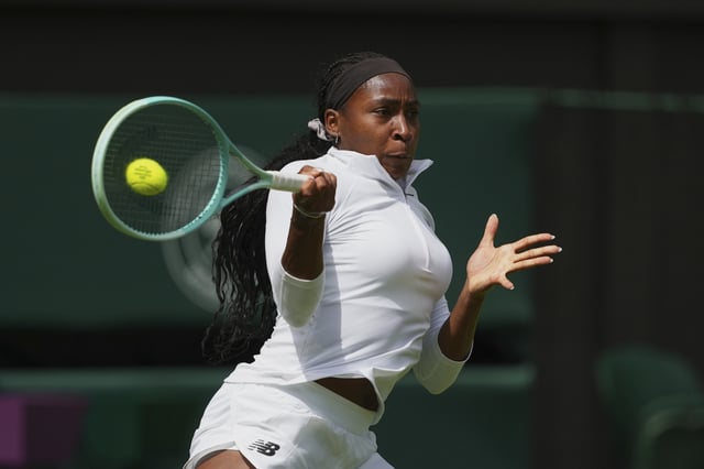 Coco Gauff of United States hits a return to Aryna Sabalenka of Belarus during a practice session ahead of the Wimbledon Championships in London, Friday, June 27, 2025. (AP Photo/Joanna Chan)
