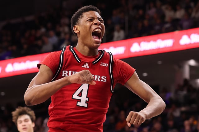 Ace Bailey #4 of the Rutgers Scarlet Knights celebrates a dunk against the Northwestern Wildcats during the second half at Welsh-Ryan Arena on January 29, 2025 in Evanston, Illinois.