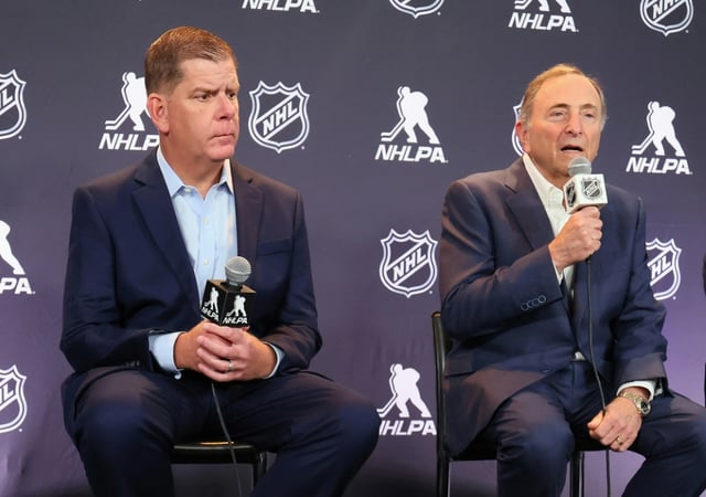 NHL commissioner Gary Bettman (right) and NHL Players' Association executive director Marty Walsh agree four-year contract extension