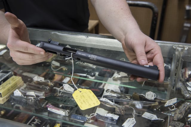 FILE - A silencer is displayed at Ed's Public Safety gun shop in Stockbridge, Ga., Jan. 31, 2017. (AP Photo/Lisa Marie Pane, File)