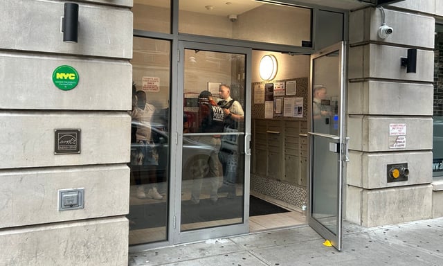 NYPD outside 90-14 161st St in Jamaica, Queens where 14-year-old Jamauri Mezar was shot in the head when a gun belonging to friends went off on June 25, 2025. (Kerry Burke/New York Daily News)