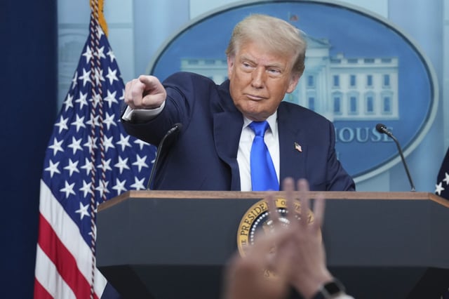 President Donald Trump points to a reporter to take a question as he speaks to the media, Friday, June 27, 2025, in the briefing room of the White House in Washington. (AP Photo/Jacquelyn Martin)