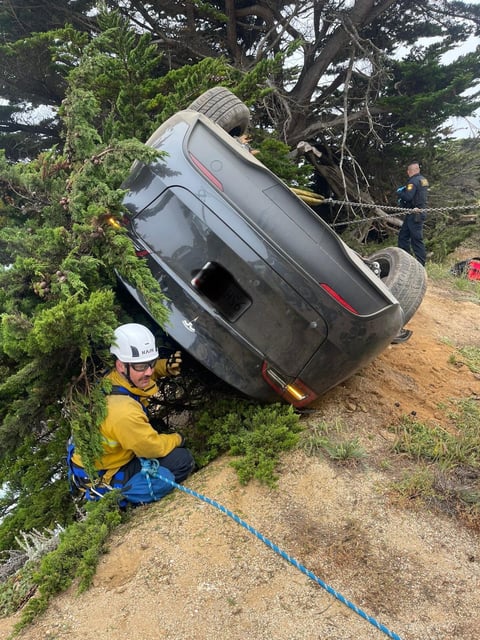 A tree stopped a car from falling down a cliff near Devil’s Slide on Highway 1 on Thursday.