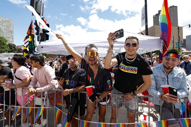 People cheer as they participate in the 53rd annual Chicago Pride Parade on June 30, 2024, in Chicago, Illinois. (Photo by KAMIL KRZACZYNSKI / AFP) (Photo by KAMIL KRZACZYNSKI/AFP via Getty Images)
