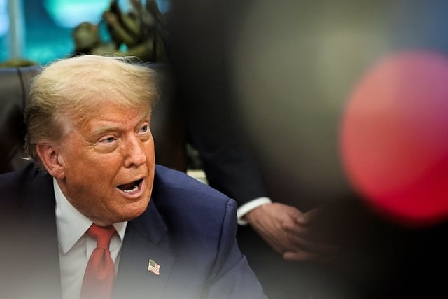 U.S. President Donald Trump speaks during a meeting with Democratic Republic of the Congo's Foreign Minister Therese Kayikwamba Wagner and Rwanda's Foreign Minister Olivier Nduhungirehe in the Oval Office at the White House in Washington D.C., June 27, 2025. REUTERS/Ken Cedeno