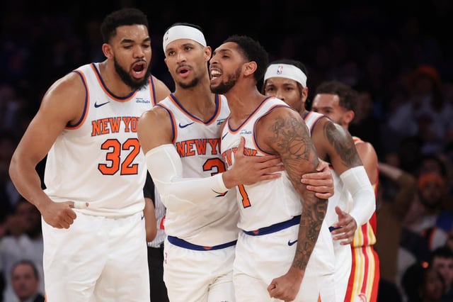 New York Knicks&#39; Cameron Payne (1) is held back by teammate New York Knicks&#39; Josh Hart (3) after he received a technical foul after scoring during the second half of an NBA basketball game against the Atlanta Hawks, Monday, Jan. 20, 2025, in New York. (AP Photo/Heather Khalifa)