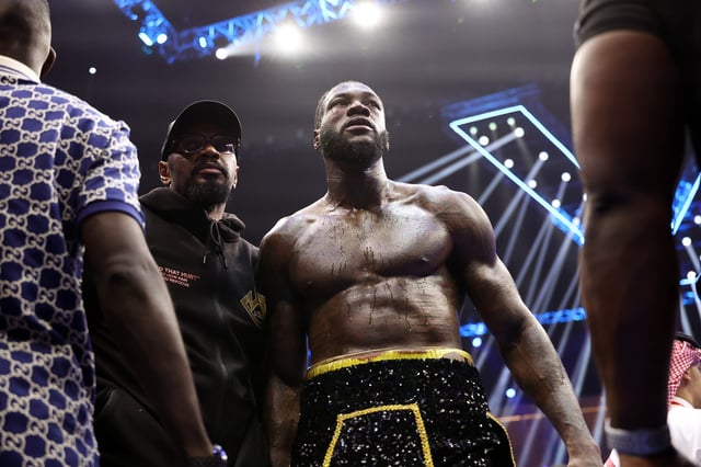 Deontay Wilder of Team Matchroom looks on after being knocked down by Zhilei Zhang of Team Queensberry during the Heavyweight fight between Deontay Wilder of Team Matchroom and Zhilei Zhang of Team Queensberry on the 5v5: Queensberry v Matchroom Fight Night card at Kingdom Arena on June 01, 2024 in Riyadh, Saudi Arabia.