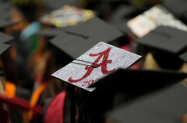 May 3, 2025; Tuscaloosa, AL, USA; Graduates express themselves on the tops of their mortar boards. The University of Alabama presented more than 6,400 degrees in the 2025 Spring Commencement.