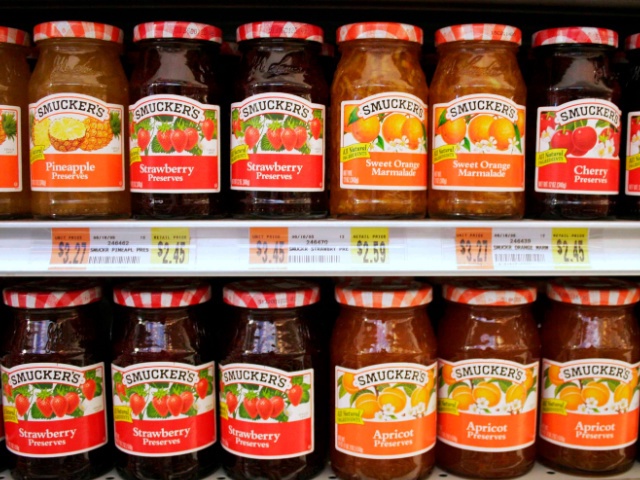 Smucker's preserves and marmalades are displayed in an Associated Supermarket in New York on Monday, August 22, 2005. J.M. Smucker Co., the largest U.S. maker of jellies and jams, said first-quarter profit declined 8.9 percent on higher marketing and interest expenses. The shares fell the most in 2 1/2 years after profit missed analysts' estimates. (Photo by Andrew Harrer/Bloomberg via Getty Images)
