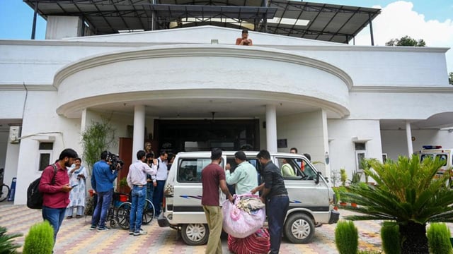 Three elderly people are rescued from the old age home on Friday. (Sunil Ghosh/HT Photo)