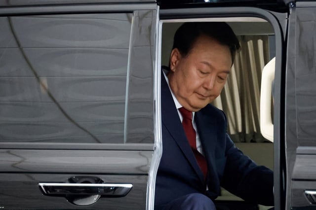 South Korea's former President Yoon Suk Yeol arrives at Seoul High Prosecutor's Office to attend questioning after being summoned as part of a probe by a special prosecutor into his botched attempt to declare martial law, in Seoul, South Korea, June 28, 2025. REUTERS/Kim Soo-hyeon