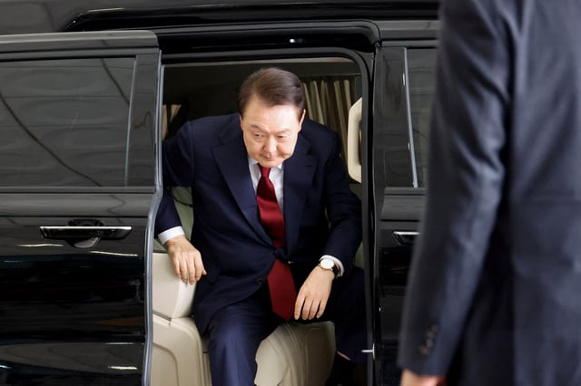 South Korea's former President Yoon Suk Yeol arrives at Seoul High Prosecutor's Office to attend questioning after being summoned as part of a probe by a special prosecutor into his botched attempt to declare martial law, in Seoul, South Korea, June 28, 2025. REUTERS/Kim Soo-hyeon