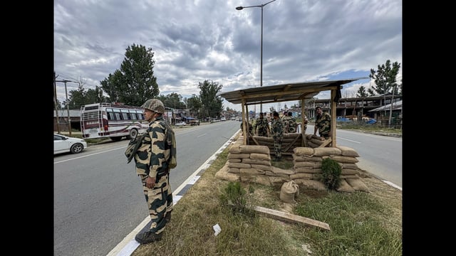 Security personnel prepare a post to keep vigil on the Jammu-Srinagar highway ahead of the annual Amarnath Yatra in Anantnag. (PTI)