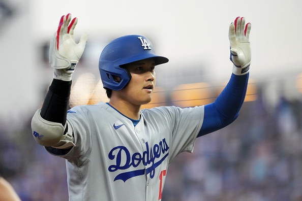 KANSAS CITY, MISSOURI – JUNE 27: Shohei Ohtani #17 of the Los Angeles Dodgers celebrates an RBI triple in the fifth inning against the Kansas City Royals  at Kauffman Stadium on June 27, 2025 in Kansas City, Missouri. (Photo by Ed Zurga/Getty Images)