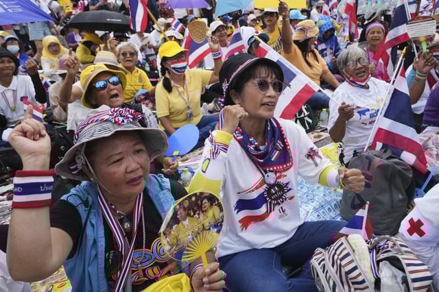 Protesters gather at Victory Monument demanding Thailand's Prime Minister Paetongtarn Shinawatra resign in Bangkok, Thailand, Saturday, June 28, 2025. (AP Photo/Sakchai Lalit)