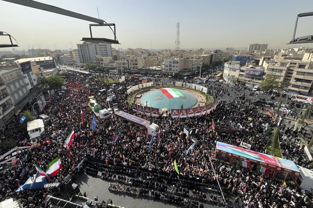 Mourners gather in Islamic Revolution Square (Enghelab Square) to attend the funeral ceremony of the Iranian army generals, nuclear scientists and their family members who were killed in Israeli strikes, during a funeral ceremony in Tehran. Iran, Saturday, June 28, 2025. (AP Photo/Vahid Salemi)