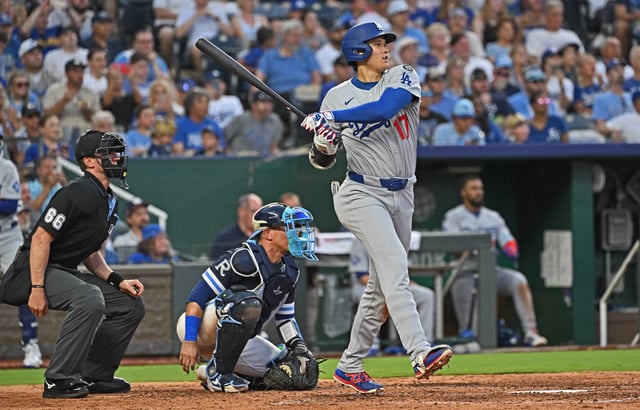 Jun 27, 2025; Kansas City, Missouri, USA; Los Angeles Dodgers designated hitter Shohei Ohtani (17) hits an RBI triple in the fifth inning against the Kansas City Royals at Kauffman Stadium. Mandatory Credit: Peter Aiken-Imagn Images