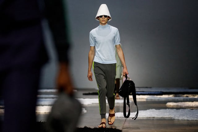 Models present creations from Prada Spring-Summer 2026 menswear collection during the Milan Fashion Week in Milan, Italy, June 22, 2025. REUTERS/Alessandro Garofalo/File Photo
