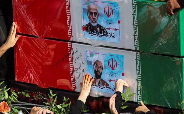 People attend the funeral procession of Iranian military commanders, nuclear scientists and others killed in Israeli strikes, in Tehran, Iran, June 28, 2025. Majid Asgaripour/WANA (West Asia News Agency) via REUTERS