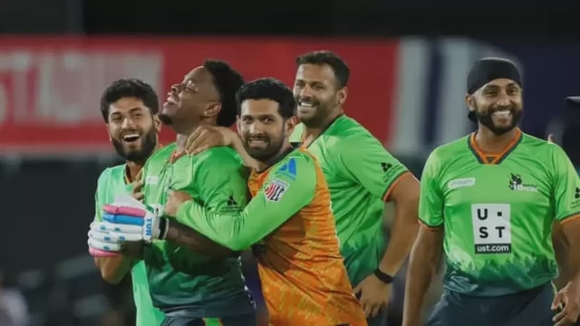 Shimron Hetmyer is swarmed by his teammates after he hit a last-ball six with six runs needed, putting on 97* to register Seattle's first win of the season.