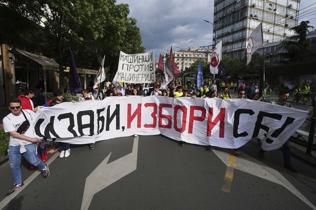 University students and people march during a protest, seven months after the deadly train station tragedy that sparked mass demonstrations against corruption in Belgrade, Serbia, Friday, May 30, 2025. (AP Photo/Darko Vojinovic)