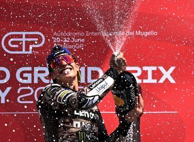 MotoGP - Italian Grand Prix - Mugello Circuit, Scarperia e San Piero, Italy - June 22, 2025 Ducati Lenovo Team's Marc Marquez celebrates on the podium after winning the Italian Grand Prix REUTERS/Jennifer Lorenzini/File Photo