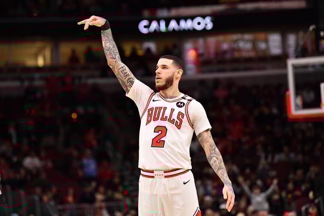 Feb 28, 2025; Chicago, Illinois, USA; Chicago Bulls forward Lonzo Ball (2) hits a three point shot against Toronto Raptors guard Jamal Shead (23) during overtime at the United Center. Mandatory Credit: Patrick Gorski-Imagn Images/File Photo