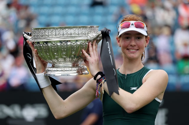 Tennis - Eastbourne Open - Devonshire Park Lawn Tennis Club, Eastbourne, Britain - June 28, 2025 Australia's Maya Joint poses with the trophy as she celebrates after winning the women's singles final against Philippines' Alexandra Eala Action Images via Reuters/Paul Childs