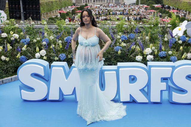 Rihanna poses for photographers upon arrival at the world premiere of the film "Smurfs", on Saturday, June 28, 2025, in Brussels. (AP Photo/Omar Havana).