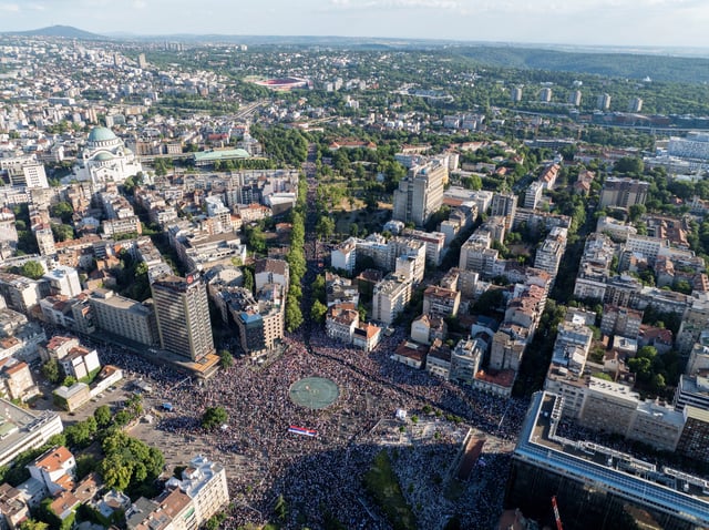 A drone view shows Serbian students and other demonstrators participating in an anti-government protest demanding snap elections at the Slavija square, in Belgrade, Serbia, June 28, 2025. REUTERS/Djordje Kojadinovic 