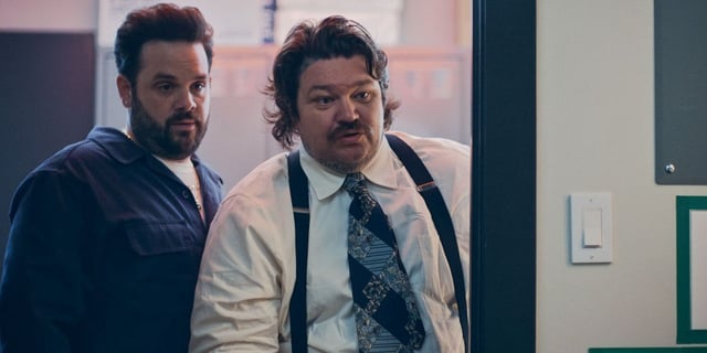 Ted (Ricky Staffieri) and Neil Fak (Matty Matheson) stand in a doorway in a scene from Season 3 of 'The Bear.'