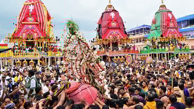 Devotees participate in the Rath Yatra of Lord Jagannath, in Puri.