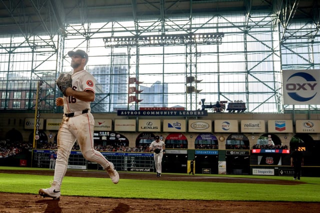 Houston Astros left fielder Cooper Hummel (16) jogs to the dugout during the fourth inning of an MLB baseball game in Houston, Saturday, June 28, 2025.