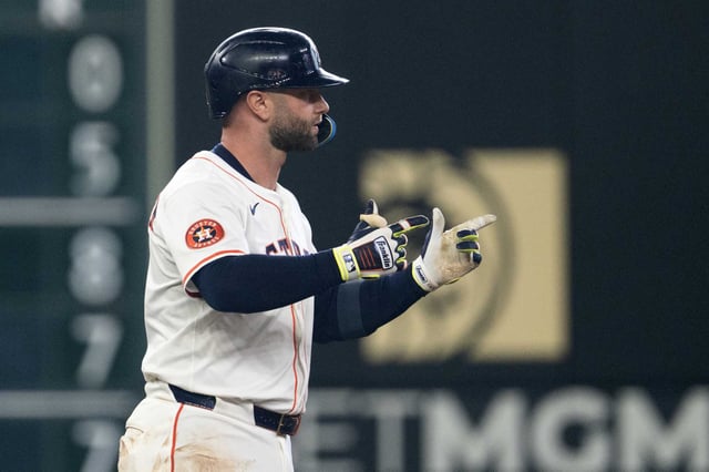 Houston Astros Christian Walker (8) reacts after hitting a double during the second inning of an MLB baseball game in Houston, Saturday, June 28, 2025.