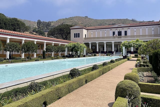 The Getty Villa Museum reopened June 27, 2025, nearly six months after it was damaged in the Los Angeles wildfires, in Pacific Palisades. The hills behind the museum are charred from the January fires that destroyed much of the surrounding area.
