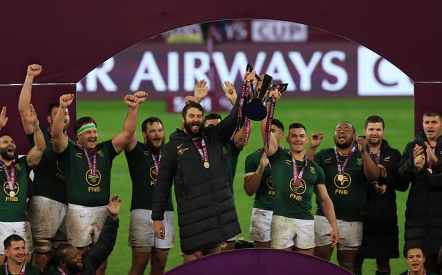 Rugby Union - South Africa v Barbarian FC - DHL Stadium, Cape Town, South Africa - June 28, 2025 South Africa's Jesse Kriel lifts the trophy with teammates to celebrate after winning the match REUTERS/Esa Alexander