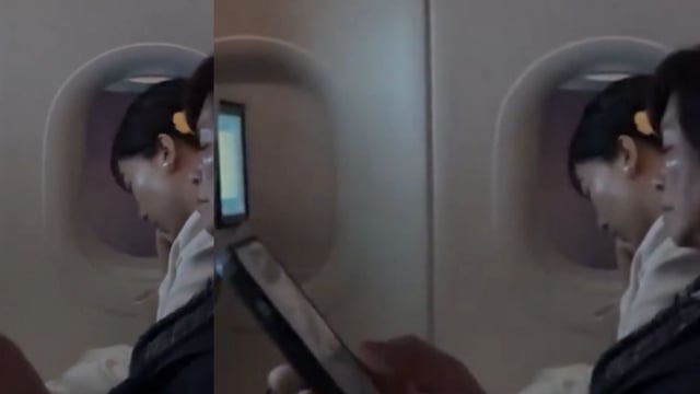In the video, falling asleep shortly after taking her seat.